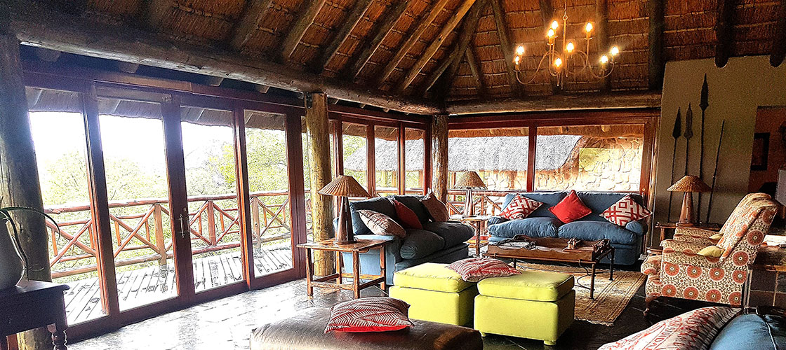 Elegant safari lodge lounge at Sekala Private Game Lodge