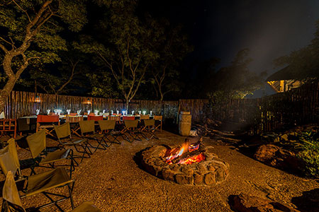 Evening boma dinner under the stars at Sekala