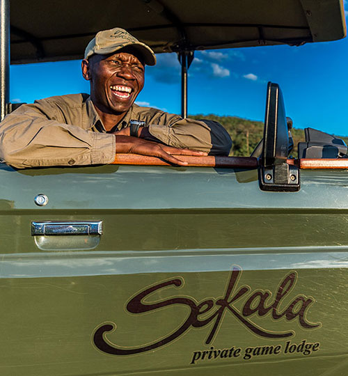Game rangers conducting wildlife briefing at Sekala lodge