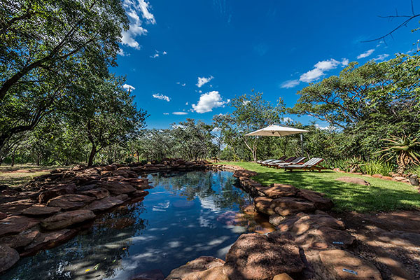 Natural rock swimming pool at Sekala safari lodge