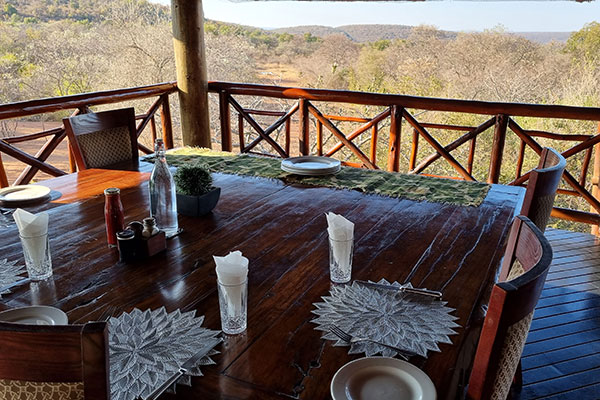 Private deck dining at Sekala Lodge
