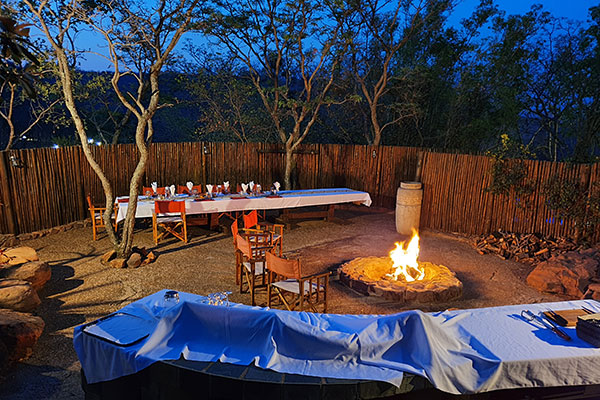 Stargazing during outdoor dinner at Sekala safari lodge